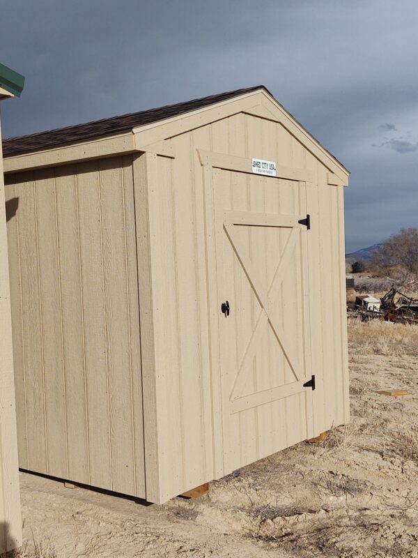 10x12 with a 4' door and dark brown shingles